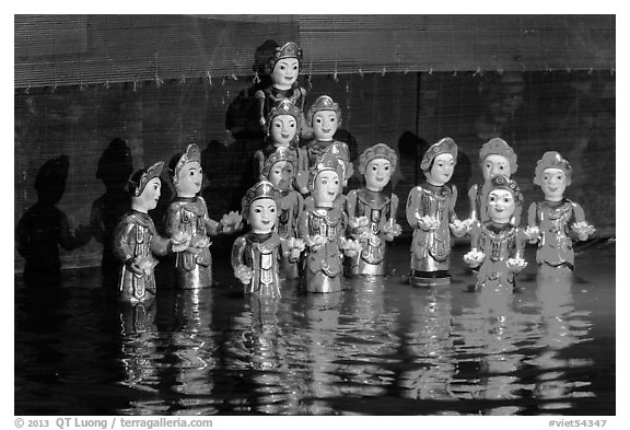 Water puppets (14 characters with lotus), Thang Long Theatre. Hanoi, Vietnam (black and white)