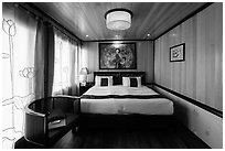 Cruise boat stateroom with curtains drawn. Halong Bay, Vietnam (black and white)