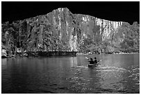 Kayaking out of Luon Cave. Halong Bay, Vietnam (black and white)