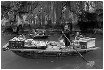 Grocer on rowboat. Halong Bay, Vietnam (black and white)