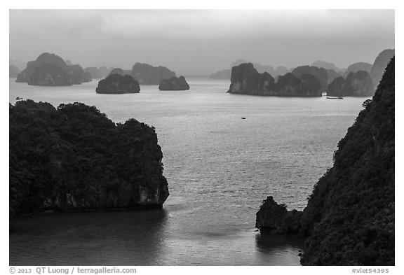 Elevated view of monolithic islands from above, evening. Halong Bay, Vietnam