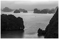 Elevated view of monolithic islands from above, evening. Halong Bay, Vietnam (black and white)