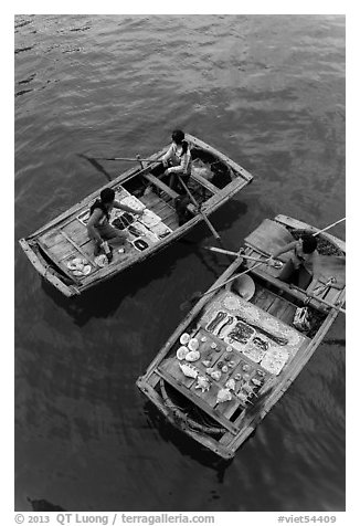 Vendors on boats seen from above. Halong Bay, Vietnam (black and white)