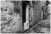 Alley with lots of painted numbers. Bat Trang, Vietnam (black and white)