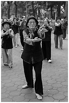Elderly women practising Tai Chi. Hanoi, Vietnam (black and white)