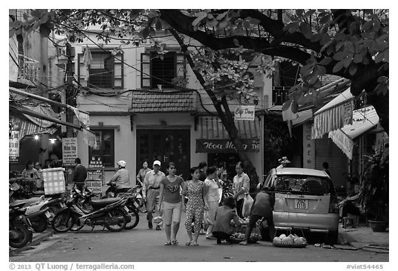 Early morning food shopping, old quarter. Hanoi, Vietnam (black and white)