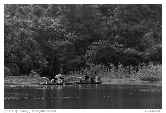 Distant wedding party, Trang An. Ninh Binh,  Vietnam (black and white)