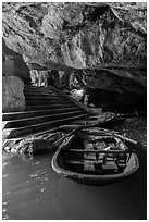 Boats moored inside cave, Trang An. Ninh Binh,  Vietnam (black and white)