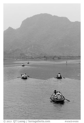 Rowboats on Sao Khe River, Trang An. Ninh Binh,  Vietnam (black and white)