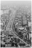 Expressway and buildings in mist seen from above. Hanoi, Vietnam (black and white)