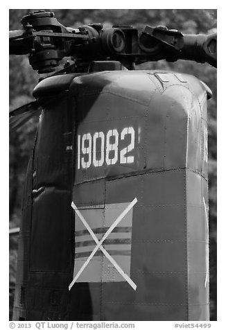 Helicopter tail with crossed-out flag of South Vietnam, Hanoi Citadel. Hanoi, Vietnam