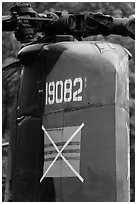 Helicopter tail with crossed-out flag of South Vietnam, Hanoi Citadel. Hanoi, Vietnam (black and white)