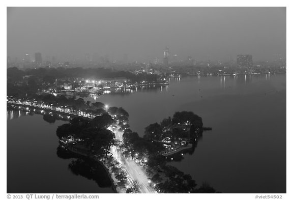 West Lake and city skyline from above by night. Hanoi, Vietnam (black and white)