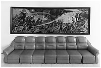 Propaganda painting and couch, military museum. Hanoi, Vietnam (black and white)
