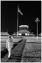 Officer walking in front of Ho Chi Minh Mausoleum. Hanoi, Vietnam (black and white)