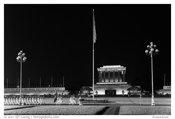 Guards marching in front of Ho Chi Minh Mausoleum at night. Hanoi, Vietnam (black and white)