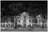 Colonial-area buildings bordering Ba Dinh Square at night. Hanoi, Vietnam (black and white)