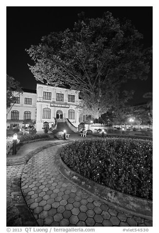 Public garden and library building at night. Hanoi, Vietnam (black and white)