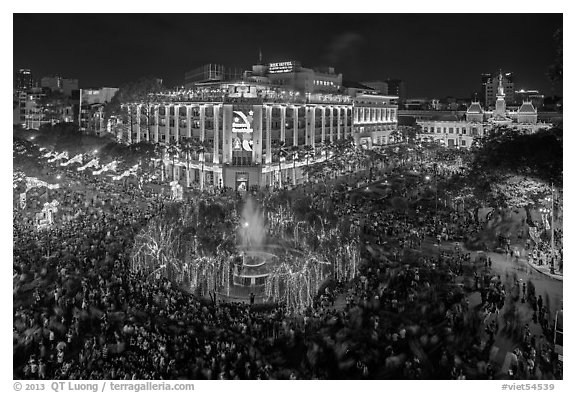 New year eve, city hall plaza with crowds. Ho Chi Minh City, Vietnam (black and white)