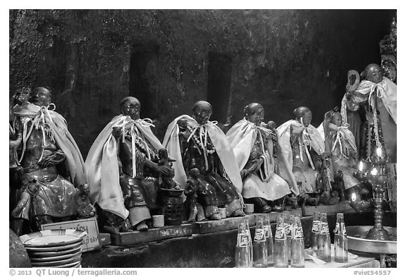 Ceramic figures of 12 women, each examplifying a human characteristic, Jade Emperor Pagoda, district 3. Ho Chi Minh City, Vietnam (black and white)