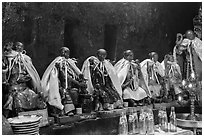 Ceramic figures of 12 women, each examplifying a human characteristic, Jade Emperor Pagoda, district 3. Ho Chi Minh City, Vietnam ( black and white)