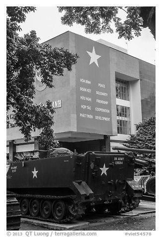 Tanks and signs extolling peace, War Remnants Museum, district 3. Ho Chi Minh City, Vietnam