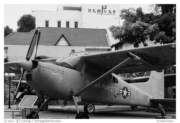 Warplane and restaurant, War Remnants Museum, district 3. Ho Chi Minh City, Vietnam (black and white)