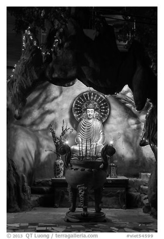 Buddha in grotto, Quoc Tu Pagoda, district 10. Ho Chi Minh City, Vietnam (black and white)