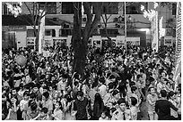 Street with Christmas eve crowds. Ho Chi Minh City, Vietnam (black and white)