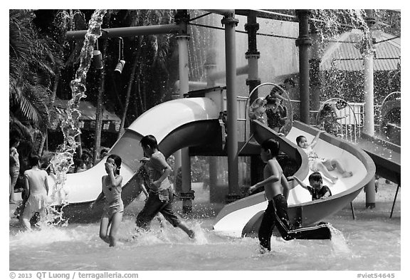 Children playing, Dam Sen Water Park, district 11. Ho Chi Minh City, Vietnam (black and white)