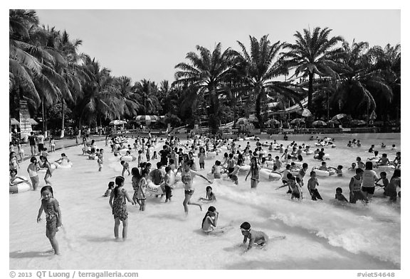 Pool with artificial waves, Dam Sen Water Park, district 11. Ho Chi Minh City, Vietnam (black and white)