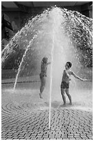 Children in fountain, Dam Sen Water Park, district 11. Ho Chi Minh City, Vietnam (black and white)