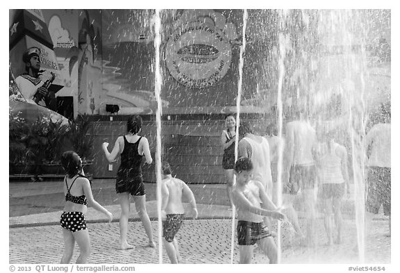 Group playing in water, Dam Sen Water Park, district 11. Ho Chi Minh City, Vietnam (black and white)