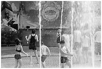 Group playing in water, Dam Sen Water Park, district 11. Ho Chi Minh City, Vietnam (black and white)