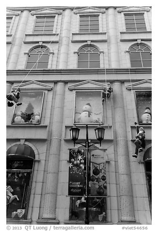 Department store with holiday decorations. Ho Chi Minh City, Vietnam (black and white)