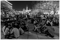 Groups in front of City Hall on New Year eve. Ho Chi Minh City, Vietnam ( black and white)