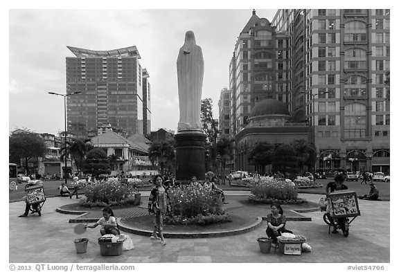 Statue on plazza in front of Notre Dame cathedral. Ho Chi Minh City, Vietnam (black and white)