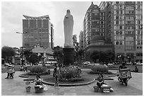 Statue on plazza in front of Notre Dame cathedral. Ho Chi Minh City, Vietnam (black and white)