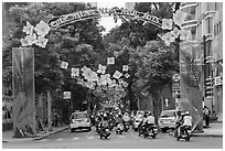 Street with holiday decorations. Ho Chi Minh City, Vietnam ( black and white)