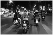 Motorbike riders at night from riders perspective. Ho Chi Minh City, Vietnam (black and white)