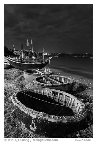 Coracle boats at night. Mui Ne, Vietnam (black and white)