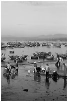 Miror-like beach and fishing boats, early morning. Mui Ne, Vietnam ( black and white)