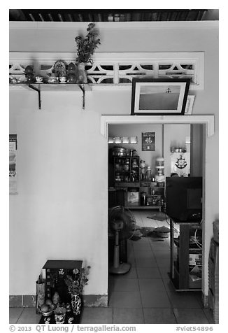 House interior with altars and picture. Mui Ne, Vietnam (black and white)