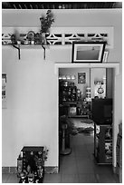 House interior with altars and picture. Mui Ne, Vietnam (black and white)