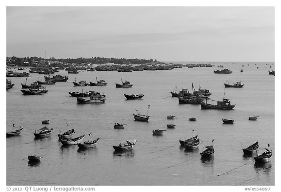 Fishing fleet and village. Mui Ne, Vietnam (black and white)