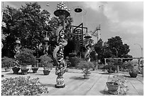 Sculptures of Chinese dragons at Temple of the Coconut Monk. My Tho, Vietnam (black and white)