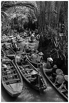 Traffic jam of boats, Phoenix Island. My Tho, Vietnam (black and white)