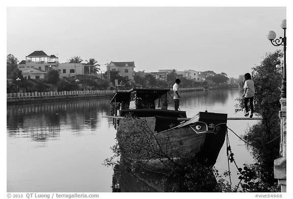 Couple on barge, Long Binh River. Tra Vinh, Vietnam (black and white)