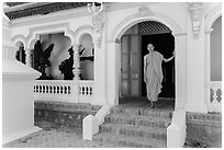 Monk standing in front of Ang Pagoda. Tra Vinh, Vietnam ( black and white)