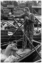 Woman and girl, Phung Diem floating market. Can Tho, Vietnam (black and white)